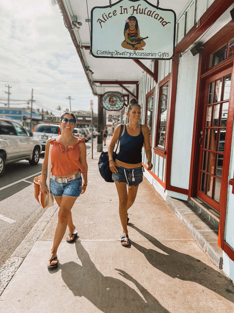 OWNERS OF Maui Pickleball Company walking down the street in Paia, HI 