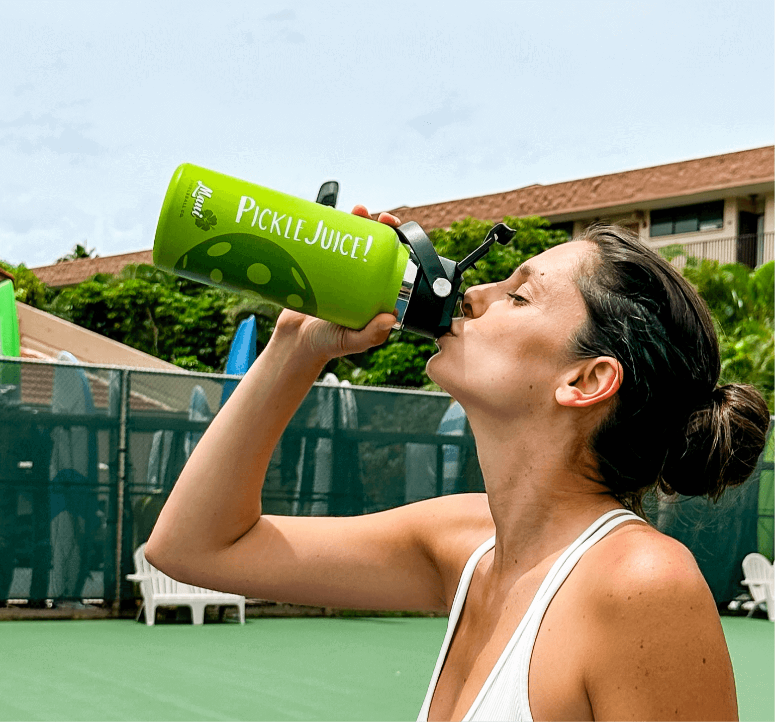 woman drinking from a Pickleball Water bottle, Cool Pickleball gear, pickle-ball equipment,
